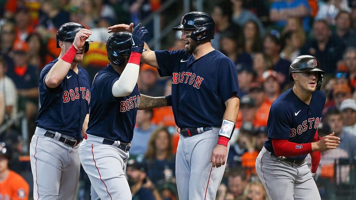 Boston Red Sox third baseman Rafael Devers, catcher Kevin Plawecki, outfielder Enrique Hernandez and infielder Christian Arroyo