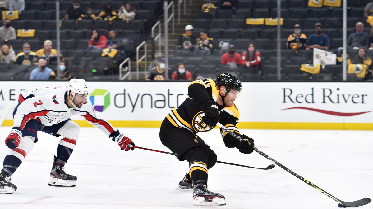 Boston Bruins left wing Taylor Hall (right)