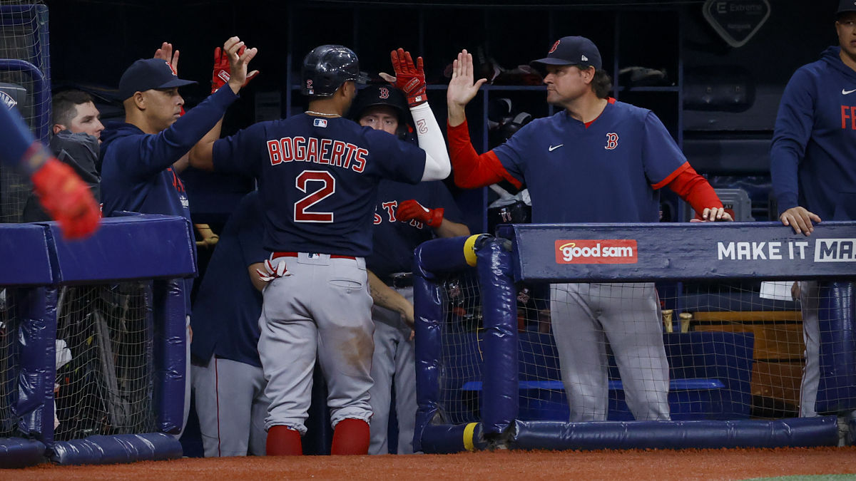 Boston Red Sox shortstop Xander Bogaerts, manager Alex Cora
