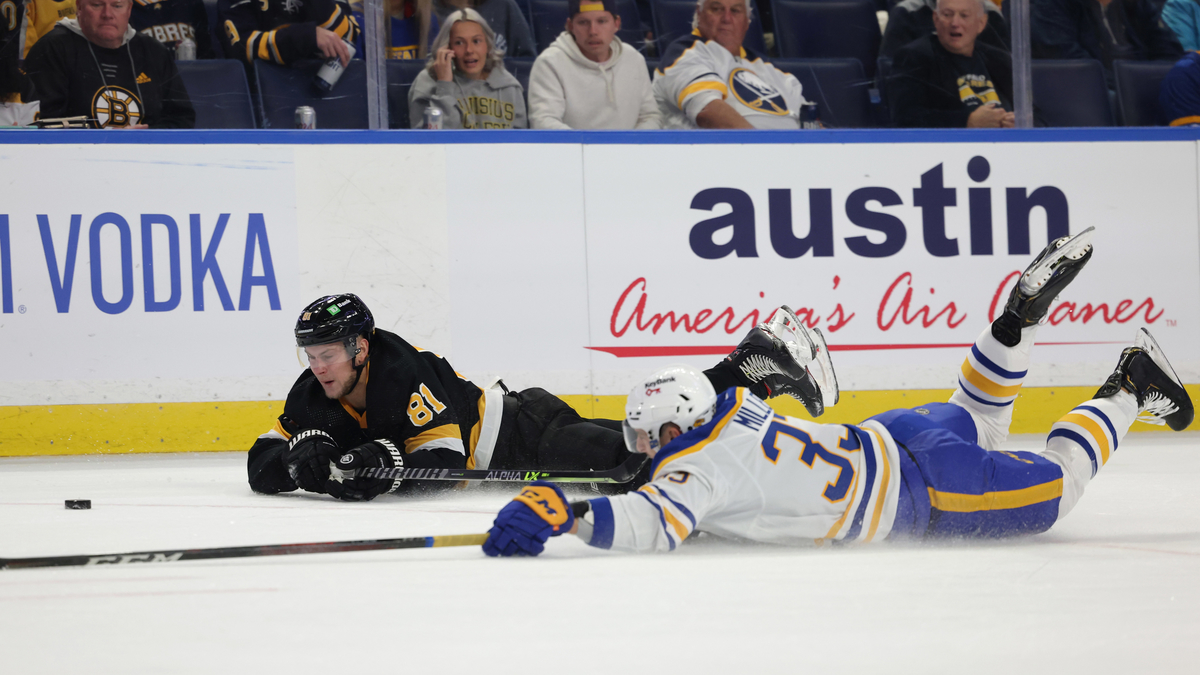 Boston Bruins forward Anton Blidh, Buffalo Sabres defenseman Colin Miller