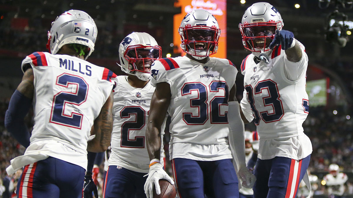 New England Patriots defensive backs Devin McCourty and Joejuan Williams