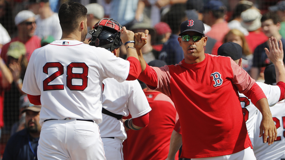 Boston Red Sox designated hitter J.D. Martinez, manager Alex Cora