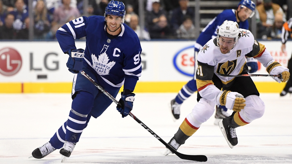 Toronto Maple Leafs forward John Tavares (91) and Las Vegas Golden Knights forward Mark Stone (61)