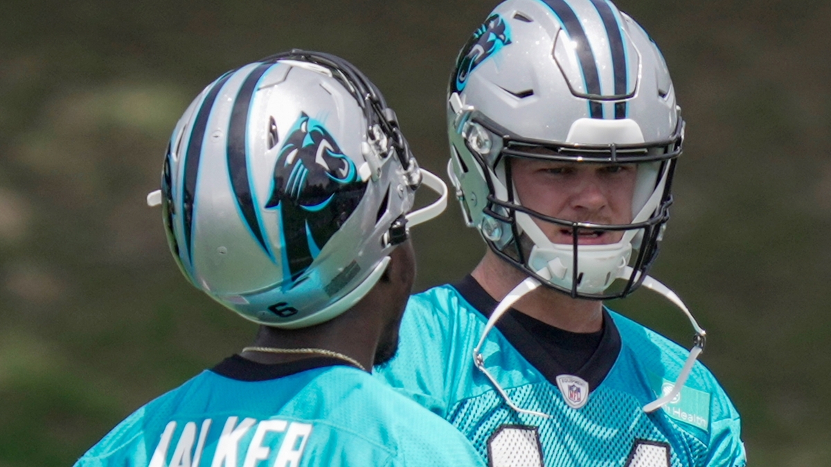 Carolina Panthers quarterbacks P.J. Walker and Sam Darnold