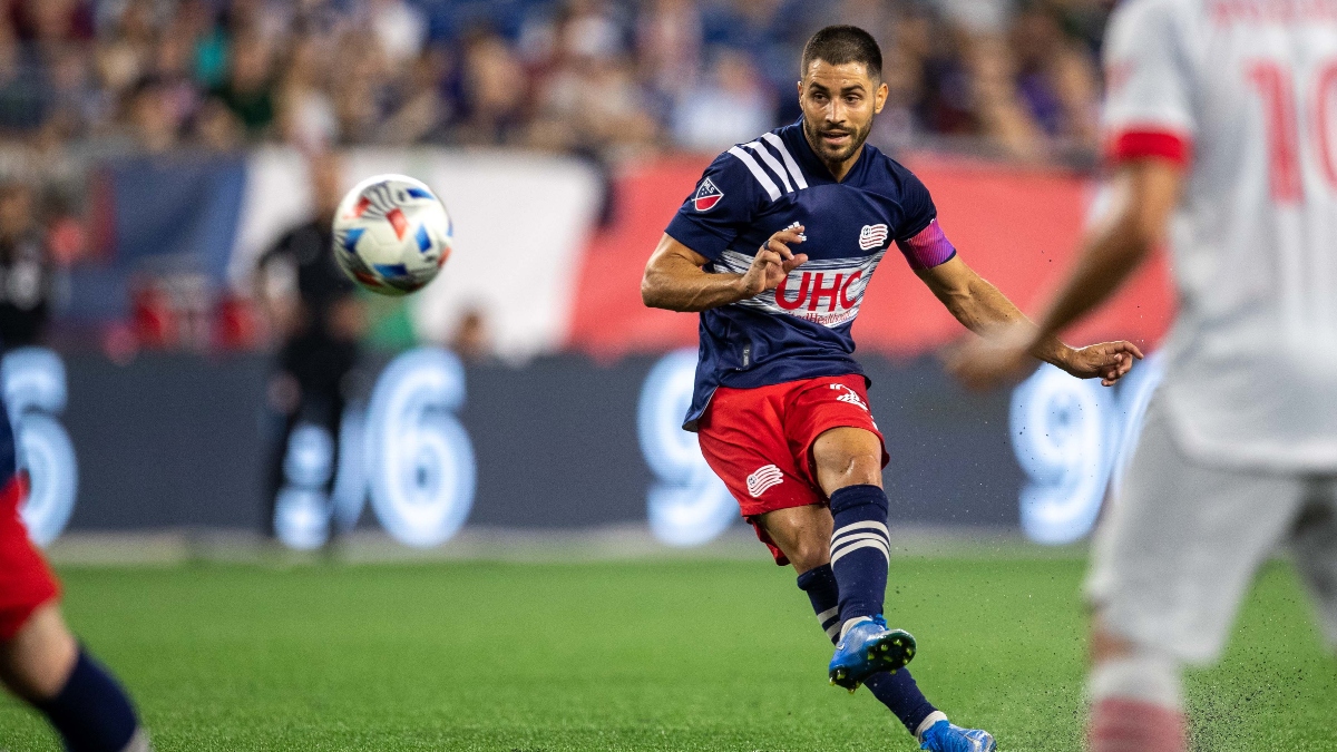 New England Revolution midfielder Carles Gil (22)