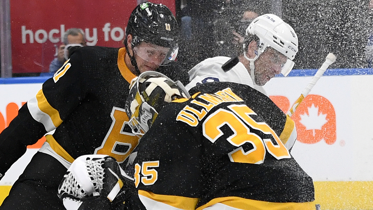 Boston Bruins forward Trent Frederic, goalie Linus Ullmark, Toronto Maple Leafs center John Tavares