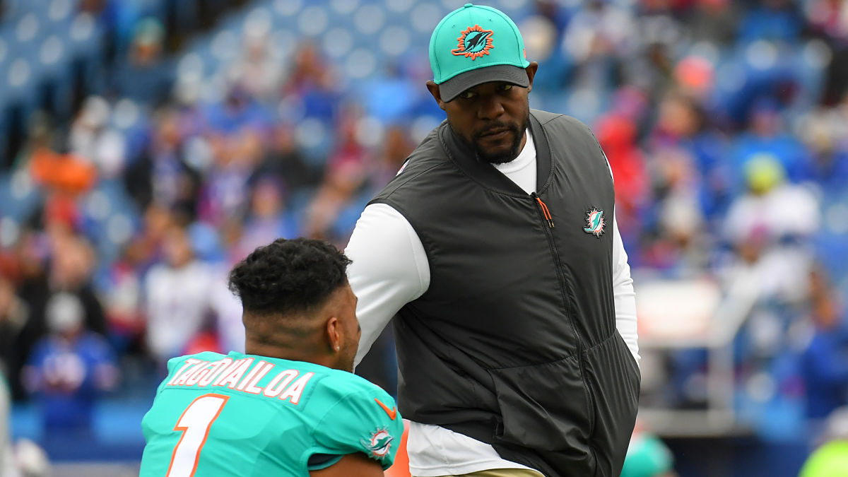 Miami Dolphins quarterback Tua Tagovailoa and former Dolphins head coach Brian Flores
