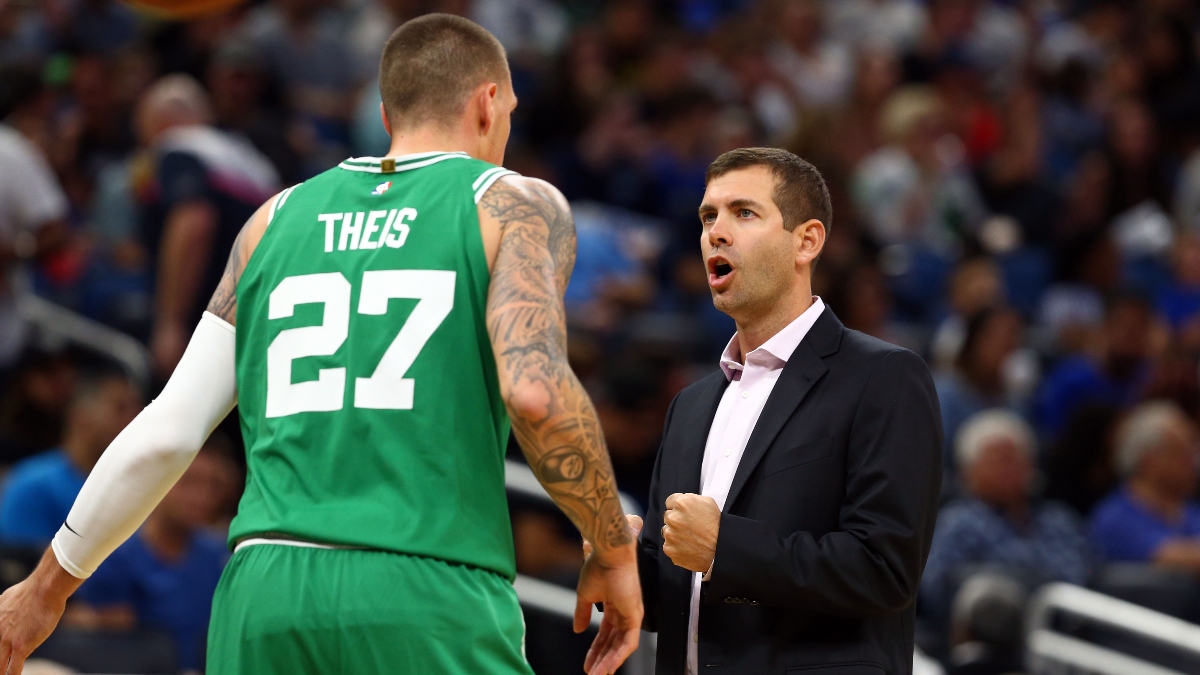 Celtics center Daniel Theis (left) and president of basketball operations Brad Stevens