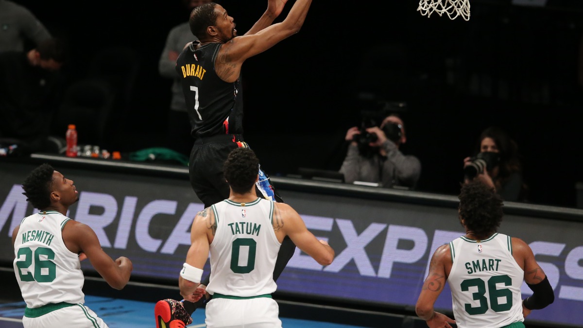 Boston Celtics guard Marcus Smart, forward Jayson Tatum, wing Aaron Nesmith