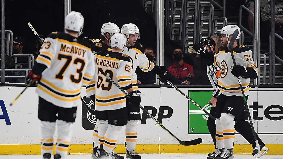 Boston Bruins defenseman Charlie McAvoy and forward Taylor Hall