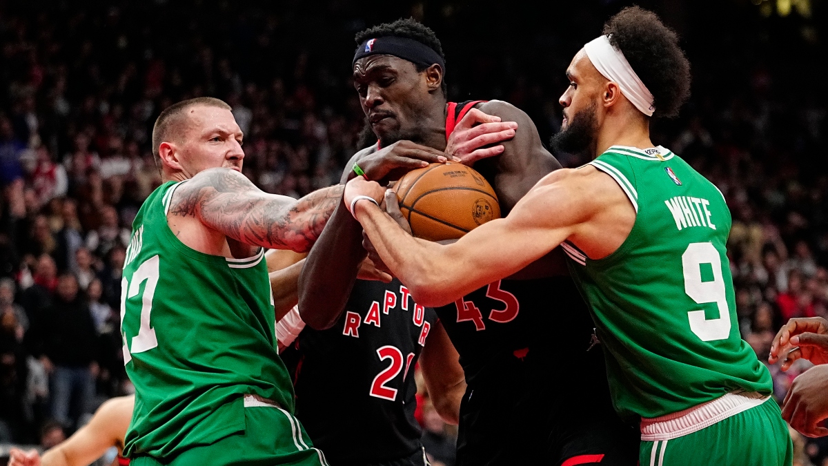 Toronto Raptors forward Pascal Siakam (43) and Boston Celtics center Daniel Theis (27) and guard Derrick White (9)