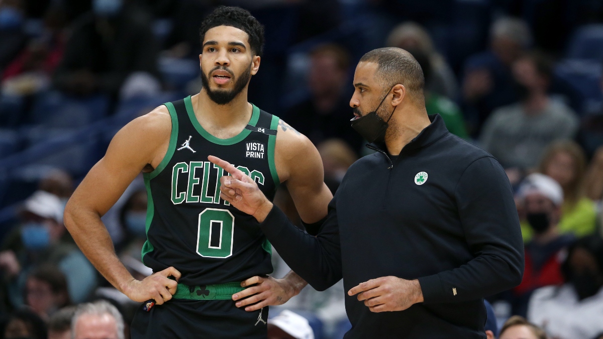 Boston Celtics head coach Ime Udoka (right) and forward Jayson Tatum (0)
