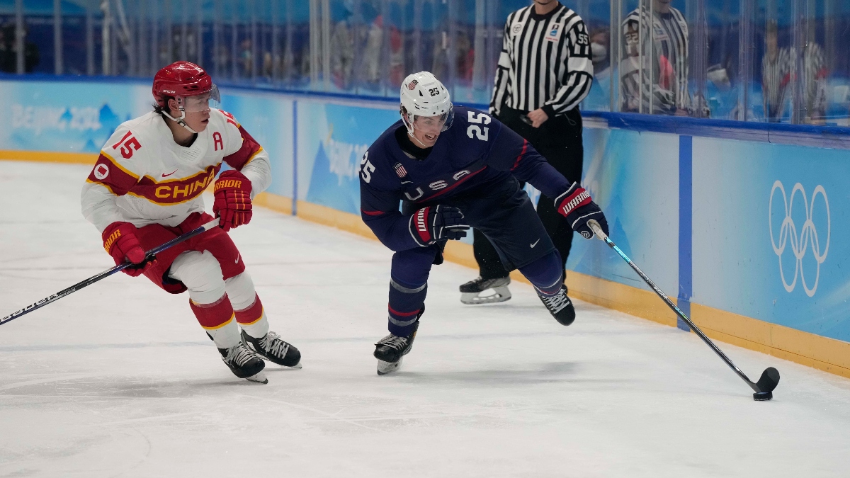 Team United States forward Marc McLaughlin (25) and Team China defender Jiang Fu (15)