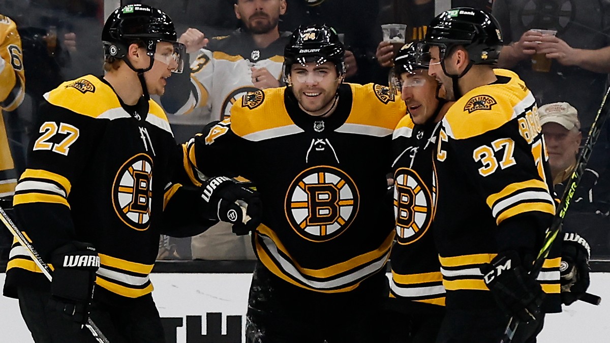 Boston Bruins left wing Jake DeBrusk (74), defenseman Hampus Lindholm (27), center Patrice Bergeron (37), left wing Brad Marchand (63)