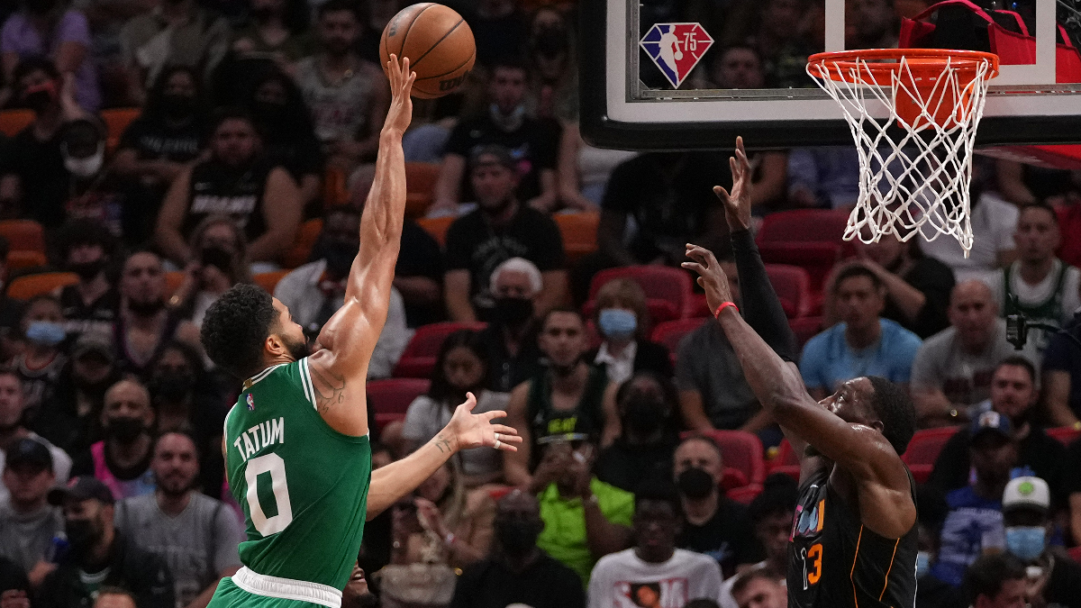 Boston Celtics forward Jayson Tatum and Miami Heat forward Bam Adebayo