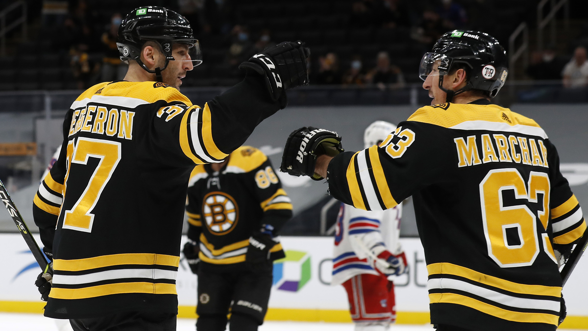 Boston Bruins forwards Patrice Bergeron and Brad Marchand
