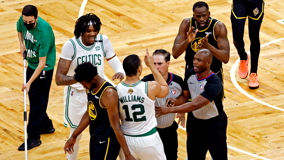 Boston Celtics forward Grant Williams and Golden State Warriors forward Draymond Green