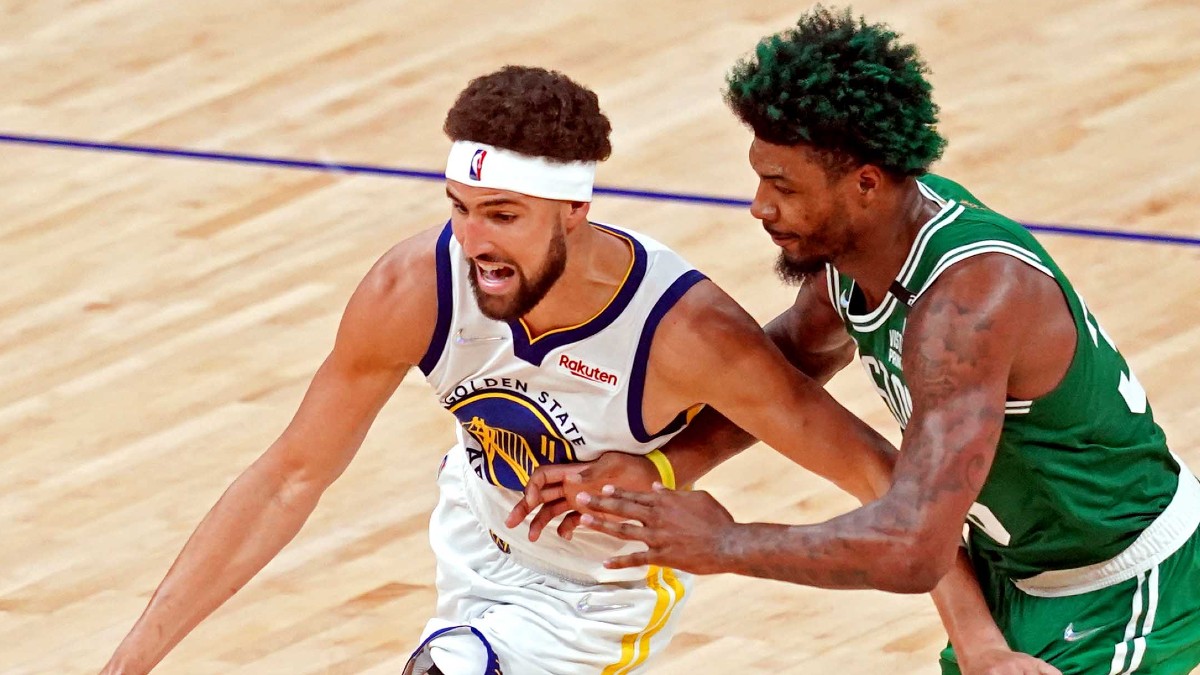 Boston Celtics guard Marcus Smart, Golden State Warriors guard Klay Thompson