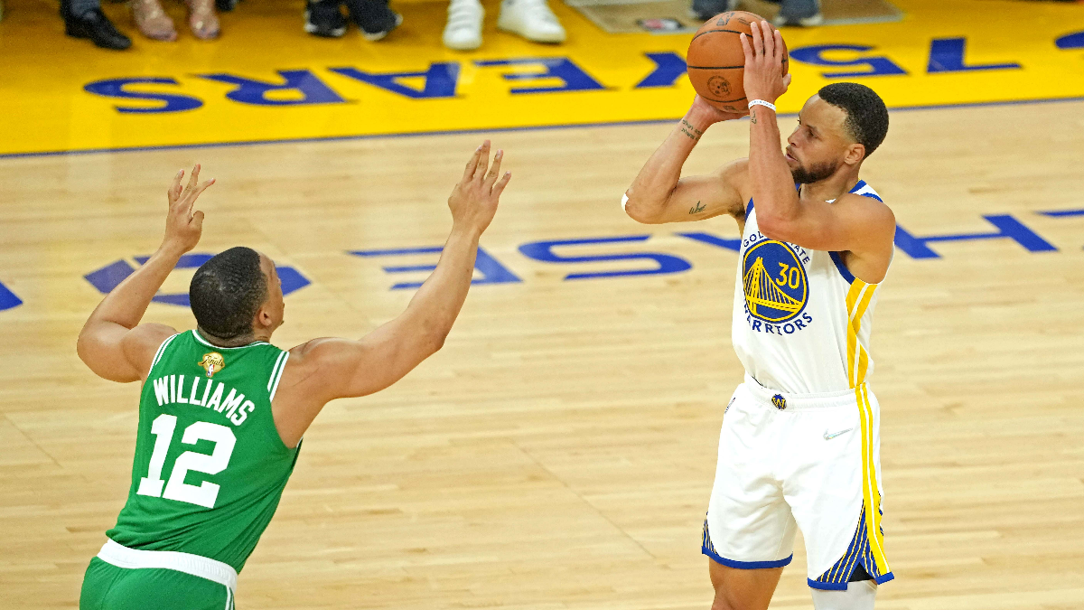 Boston Celtics forward Grant Williams and Golden State Warriors guard Stephen Curry