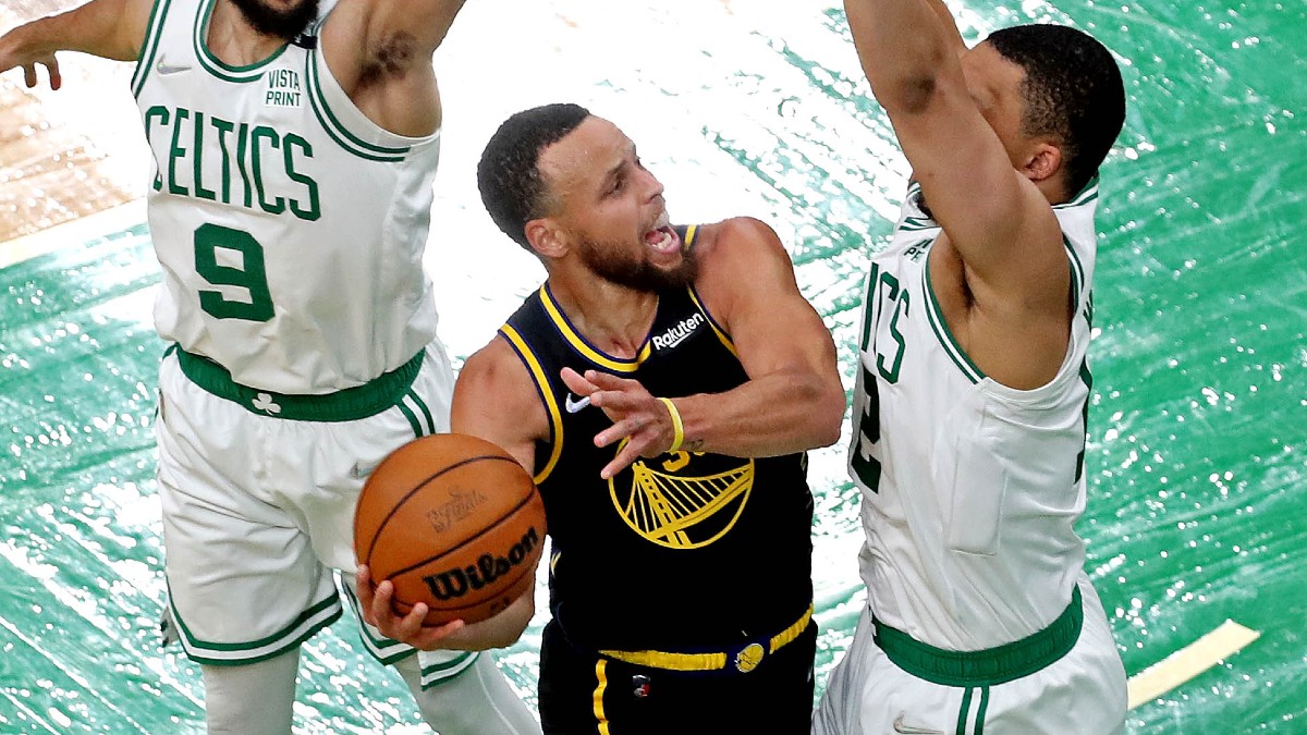 Golden State Warriors guard Stephen Curry and Boston Celtics forward Grant Williams