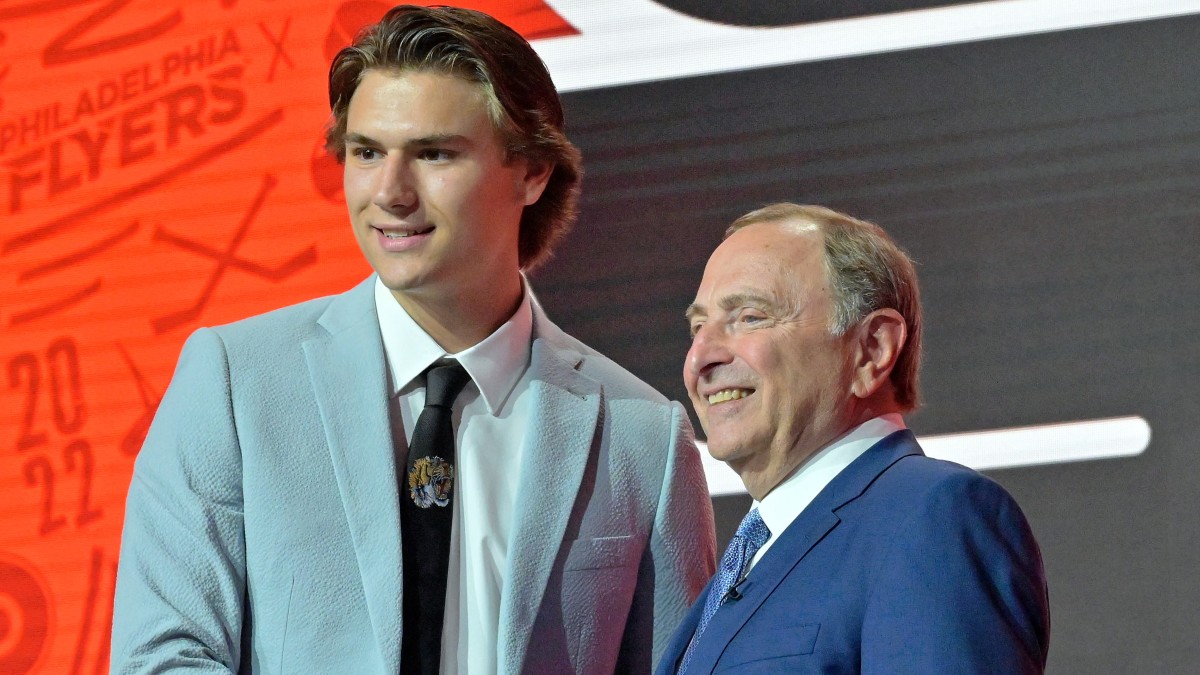 Philadelphia Flyers left wing Cutter Gauthier, NHL commissioner Gary Bettman