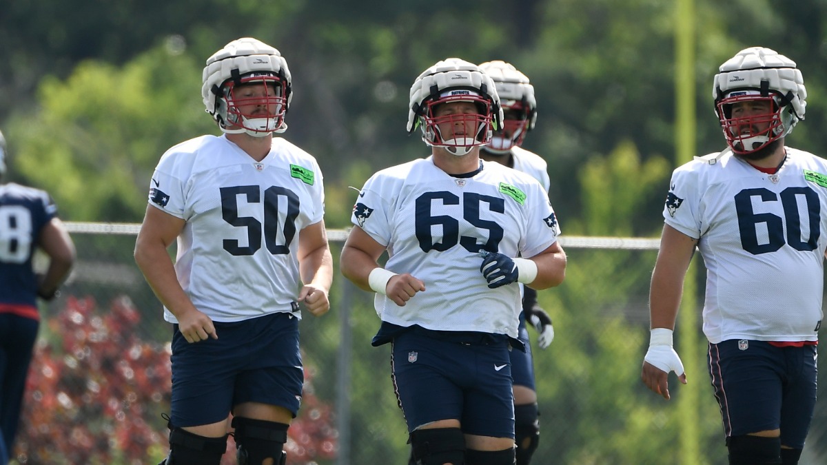 New England Patriots offensive linemen Cole Strange, James Ferentz, David Andrews