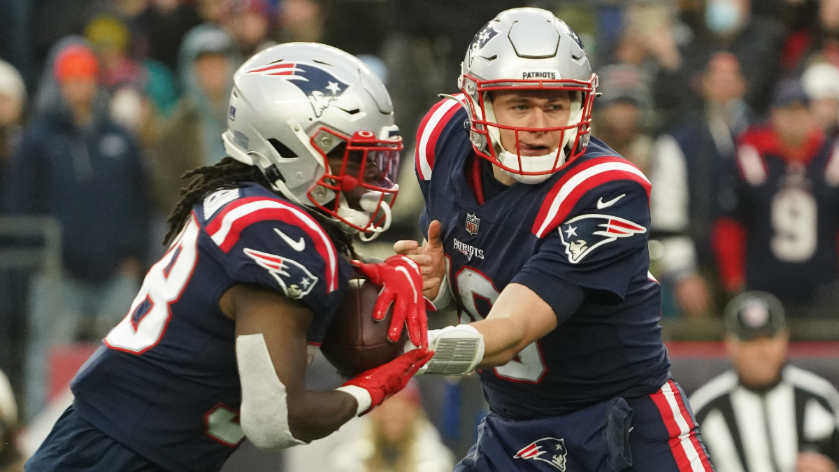 New England Patriots running back Rhamondre Stevenson and quarterback Mac Jones
