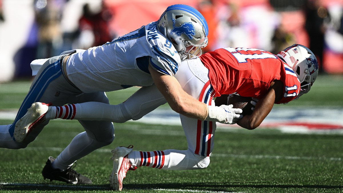 Detroit Lions defensive end Aidan Hutchinson and New England Patriots wide receiver Tyquan Thornton