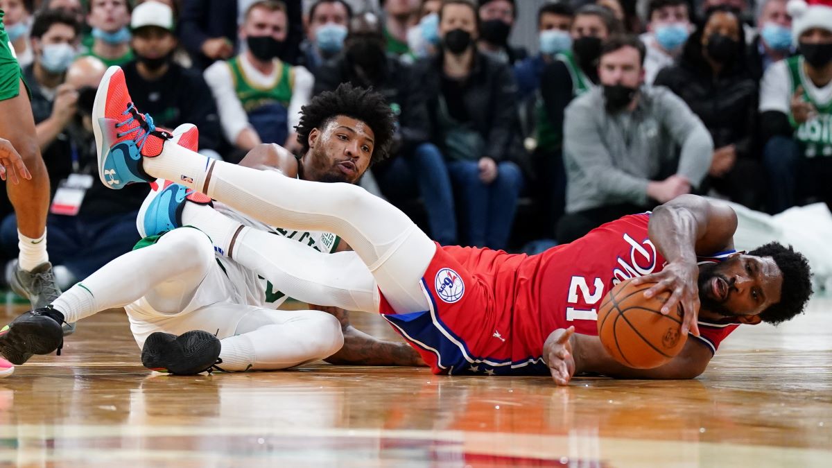 Boston Celtics guard Marcus Smart and Philadelphia 76ers center Joel Embiid