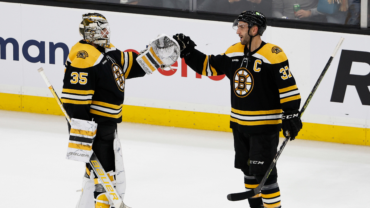 Boston Bruins center Patrice Bergeron, goaltender Linus Ullmark