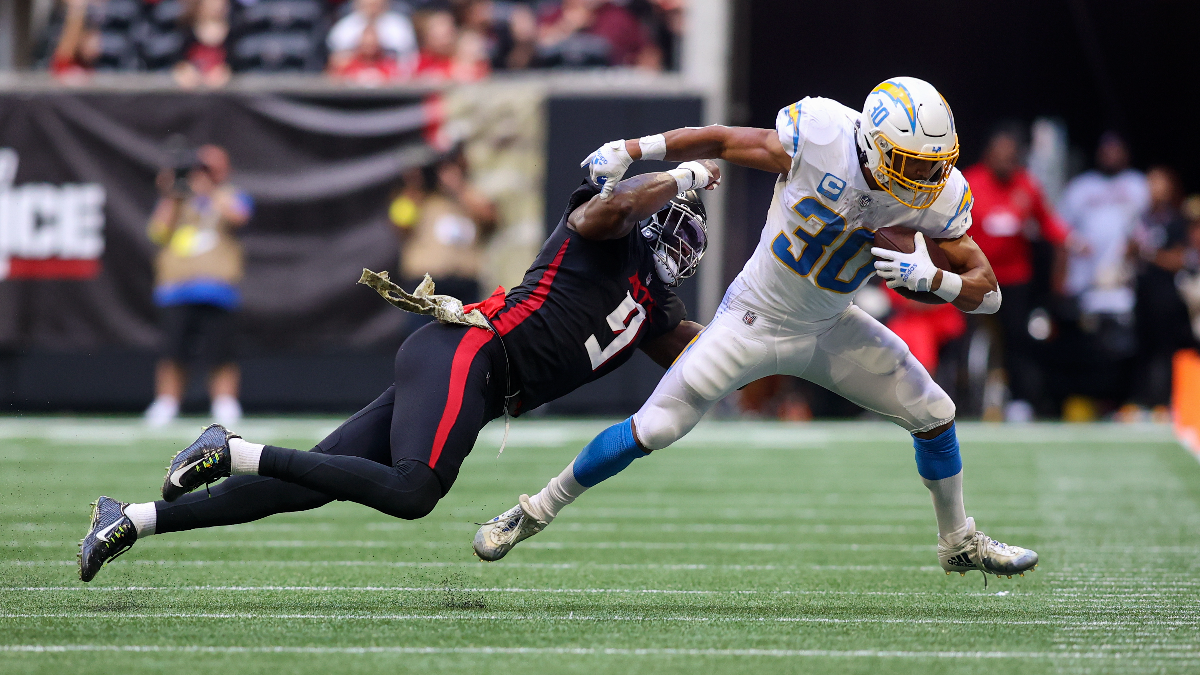 Atlanta Falcons linebacker Lorenzo Carter and Los Angeles Chargers running back Austin Ekeler