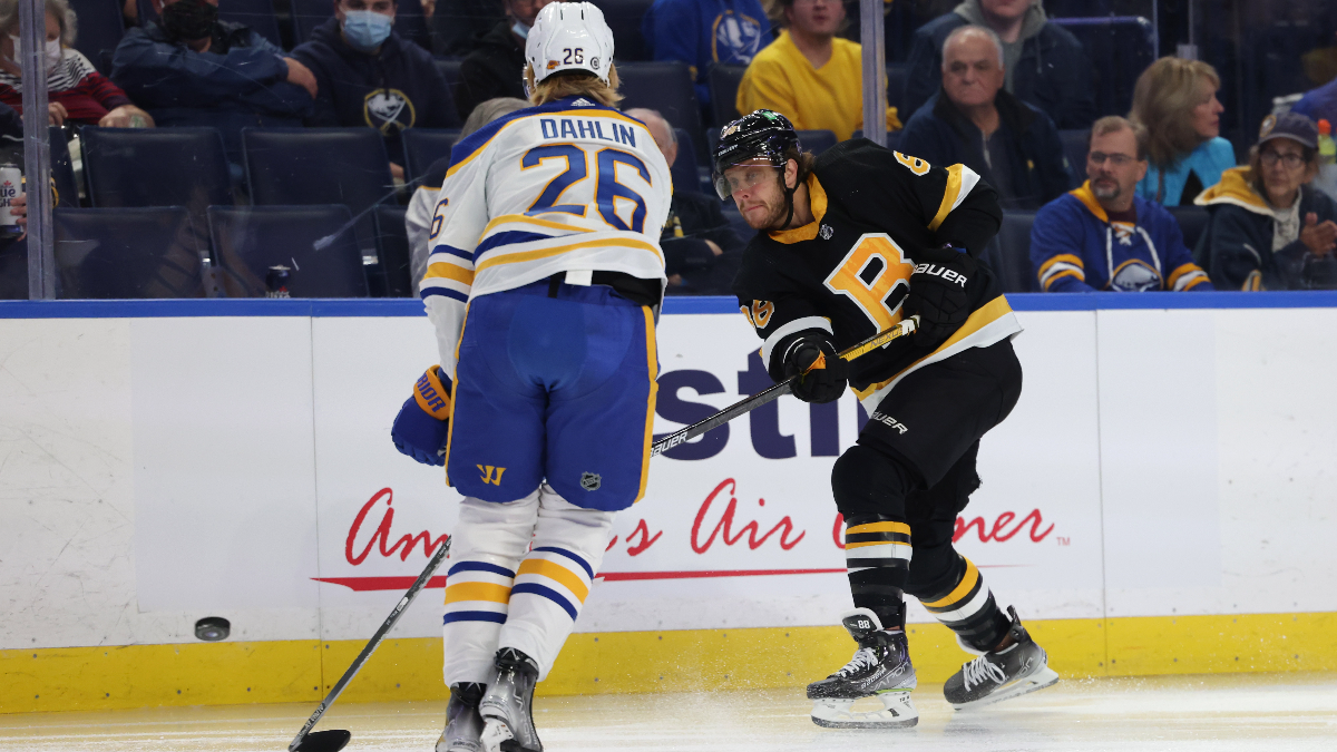 Buffalo Sabres defenseman Rasmus Dahlin and Boston Bruins wing David Pastrnak