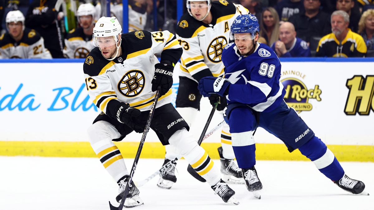 Boston Bruins center Charlie Coyle, Tampa Bay Lightning defenseman Mikhail Sergachev
