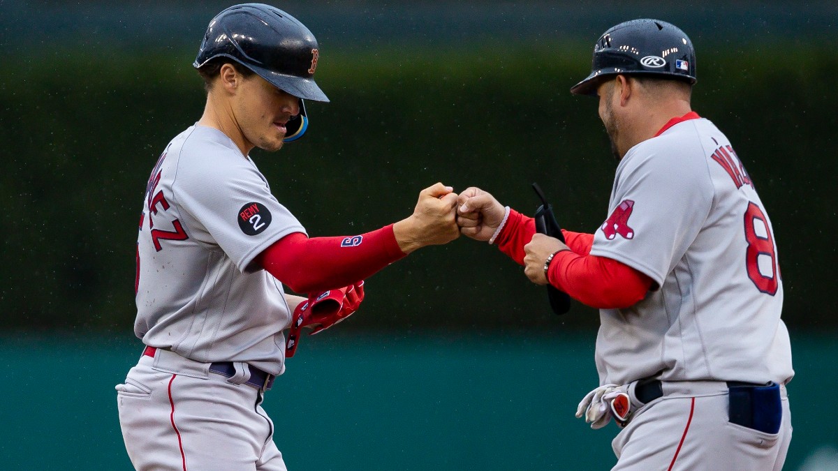 Boston Red Sox first base coach Ramon Vazquez, outfielder Kiké Hernández