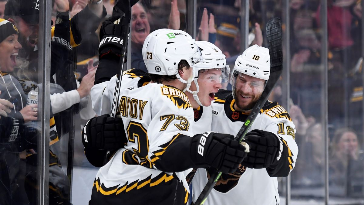 Boston Bruins teammates Charlie McAvoy, Trent Frederic and Pavel Zacha