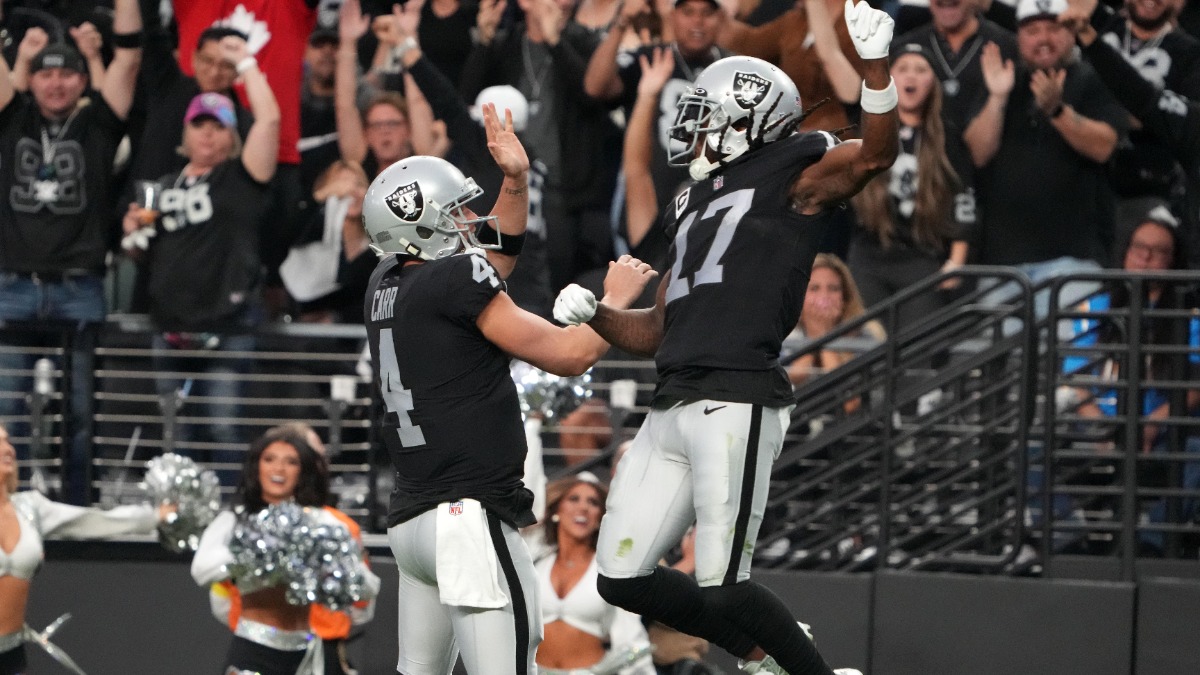 Las Vegas Raiders wide receiver Davante Adams, quarterback Derek Carr