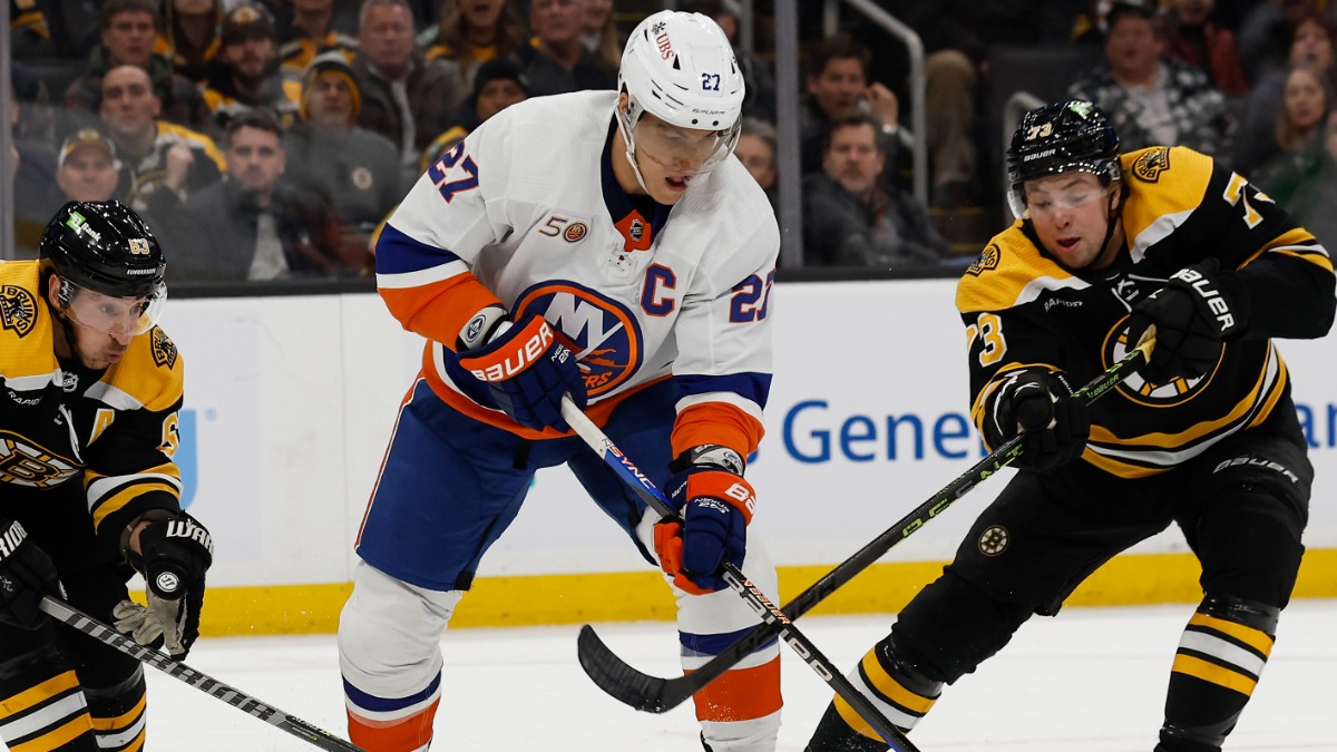 New York Islanders left wing Anders Lee, Boston Bruins winger Brad Marchand and defenseman Charlie McAvoy