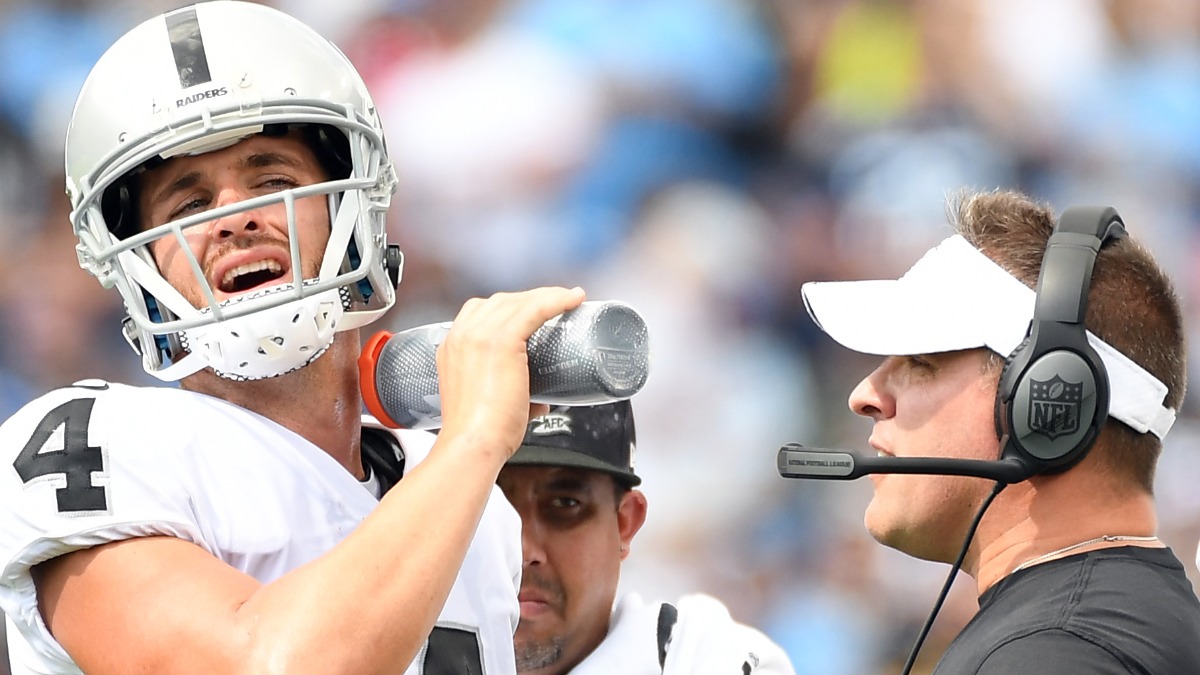 Las Vegas Raiders head coach Josh McDaniels, quarterback Derek Carr