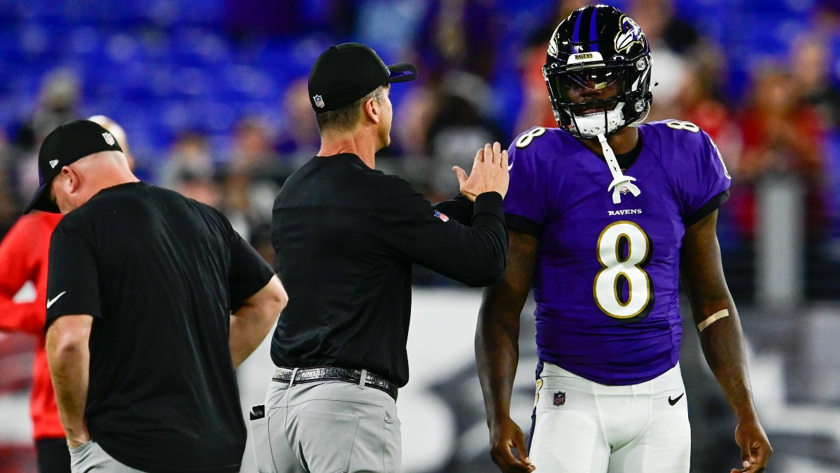 Baltimore Ravens head coach John Harbaugh and quarterback Lamar Jackson
