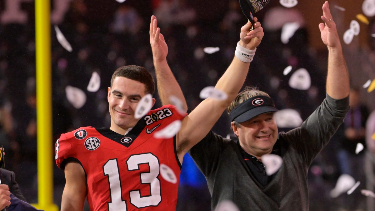 Georgia Bulldogs quarterback Stetson Bennett and head coach Kirby Smart