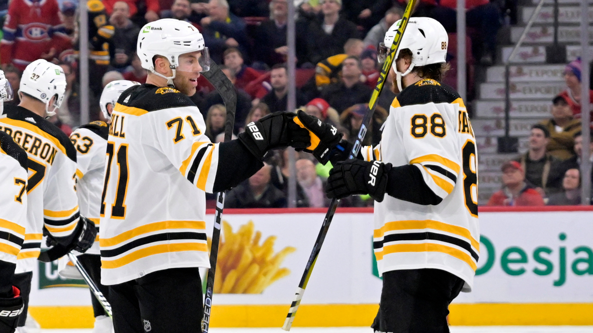 Boston Bruins forwards Taylor Hall and David Pastrnak