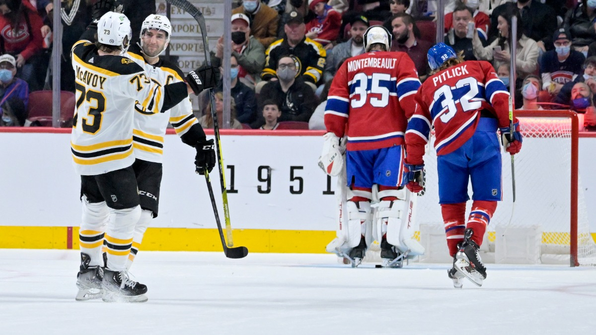 Boston Bruins center Patrice Bergeron, defenseman Charlie McAvoy