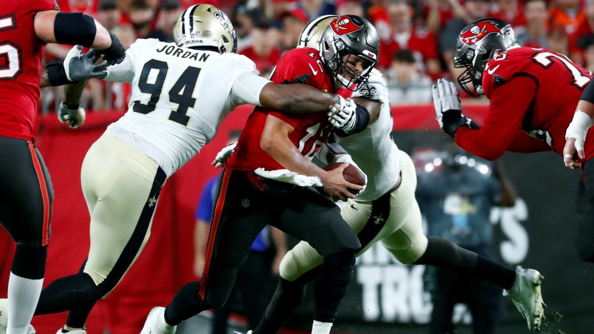 New Orleans Saints defensive end Cameron Jordan and former NFL quarterback Tom Brady