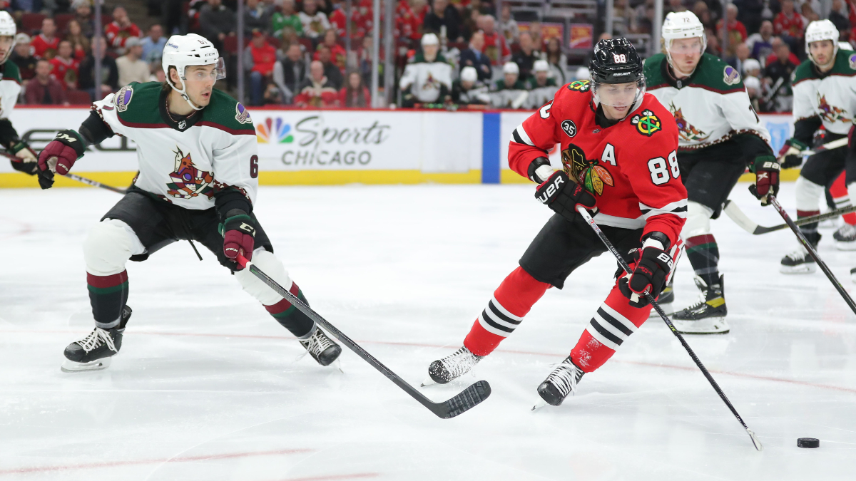 Arizona Coyotes defenseman Jakob Chychrun and Chicago Blackhawks forward Patrick Kane