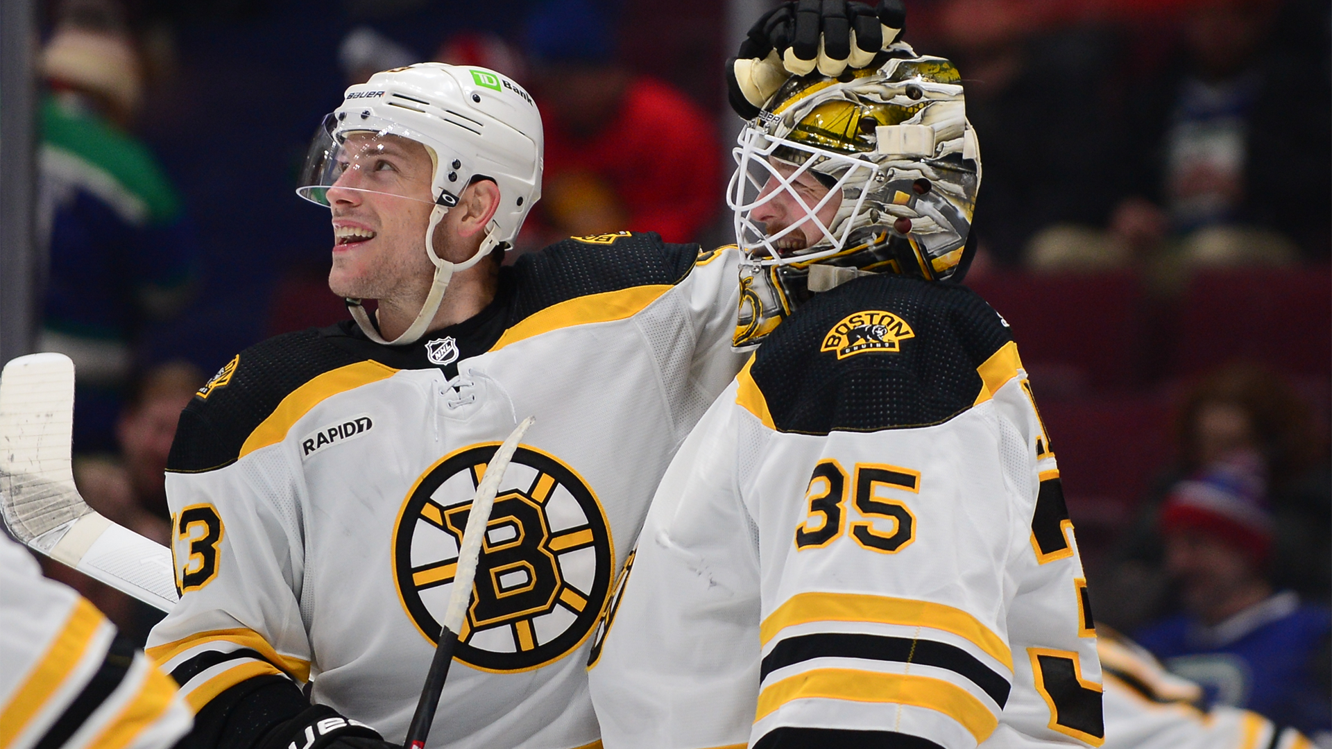 Boston Bruins goalie Linus Ullmark and forward Charlie Coyle