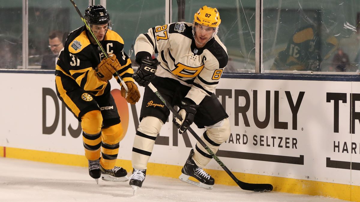 Boston Bruins center Patrice Bergeron and Pittsburgh Penguins center Sidney Crosby
