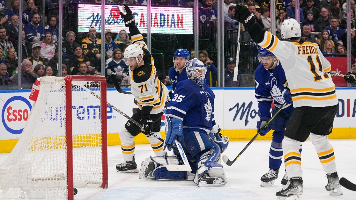Boston Bruins left wing Taylor Hall and forward Trent Frederic