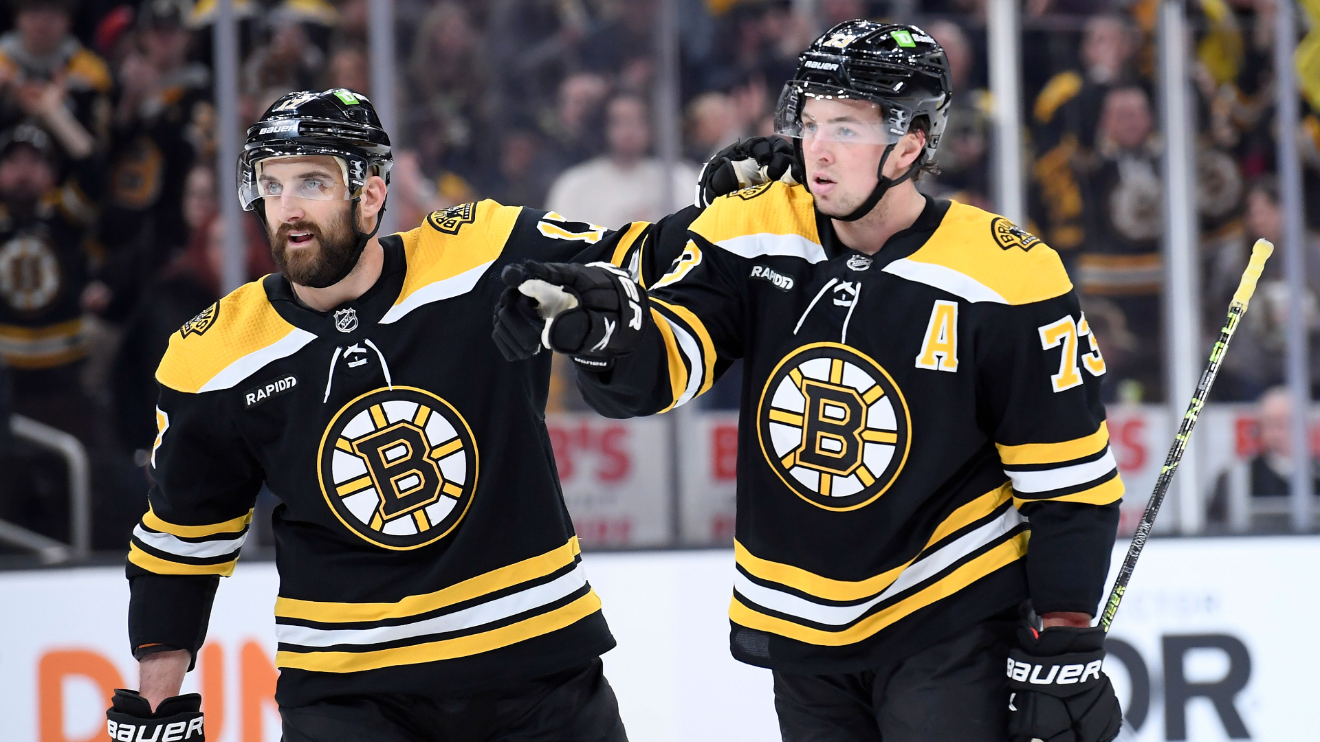 Boston Bruins left wing Nick Foligno, defenseman Charlie McAvoy