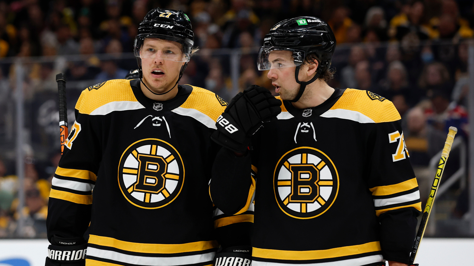 Boston Bruins defensemen Hampus Lindholm and Charlie McAvoy
