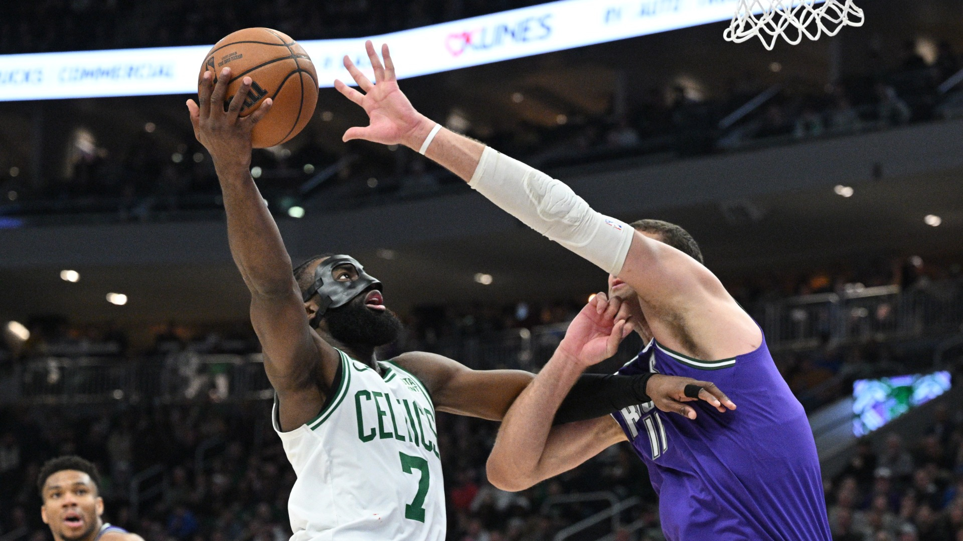Boston Celtics guard Jaylen Brown and Milwaukee Bucks center Brook Lopez